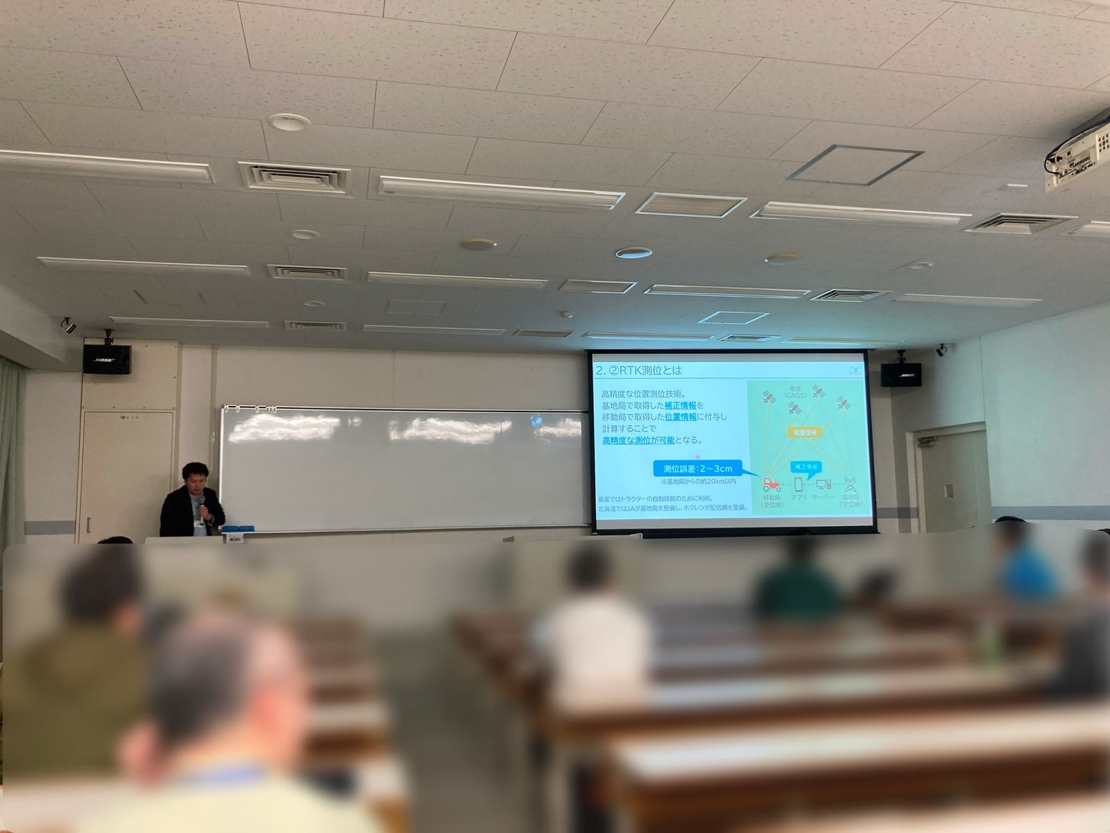Yamamoto of the Hokuren Federation of Agricultural Cooperatives presenting