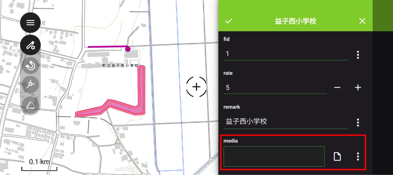 An attachment attribute displayed in QField (created by processing GSI Tiles)