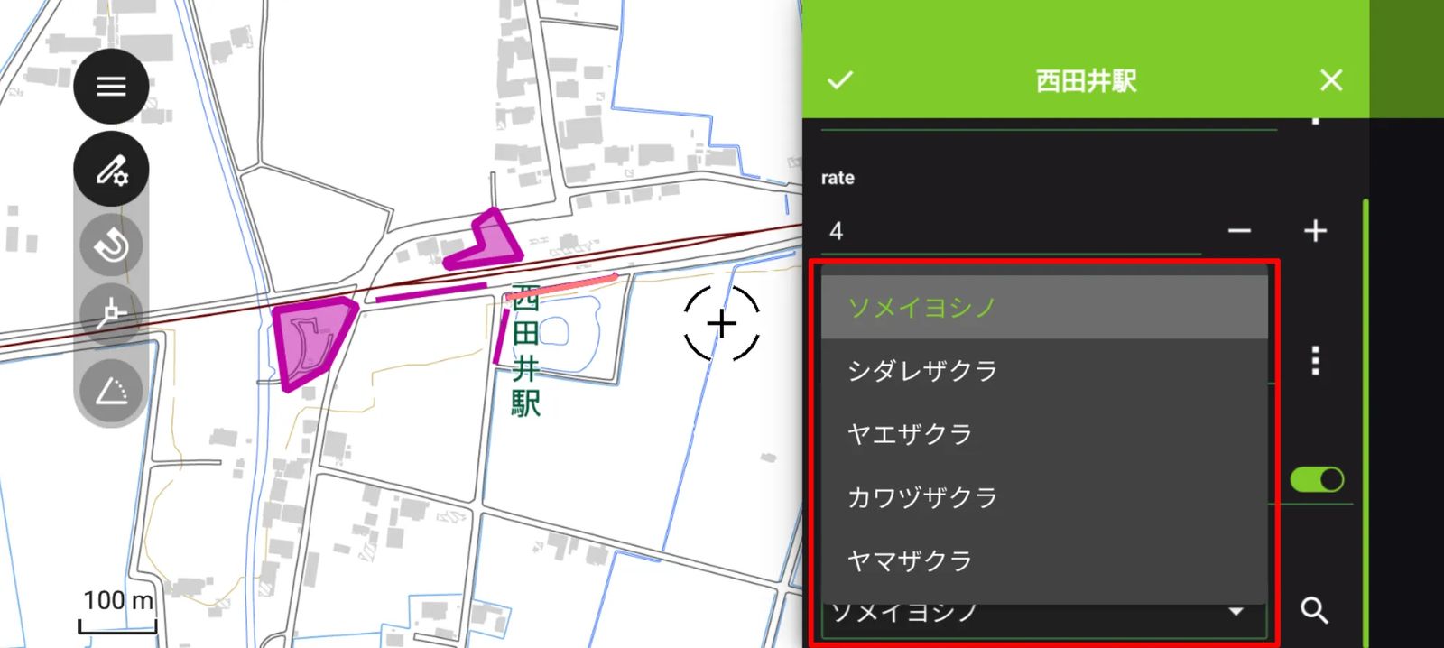 The text attribute appears as a drop-down menu in QField (created by processing GSI Tiles)